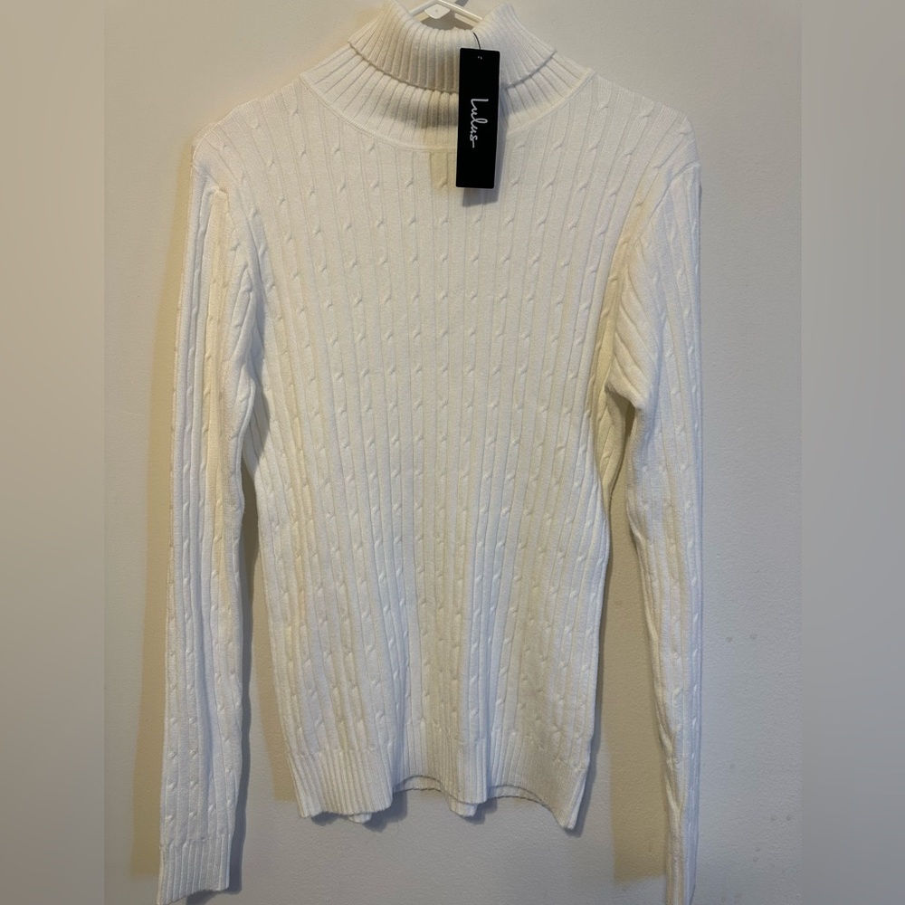White turtleneck from Lulu’s. Size XL